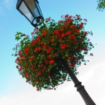 Transform a lamp post with flowers, glitter, ribbon!